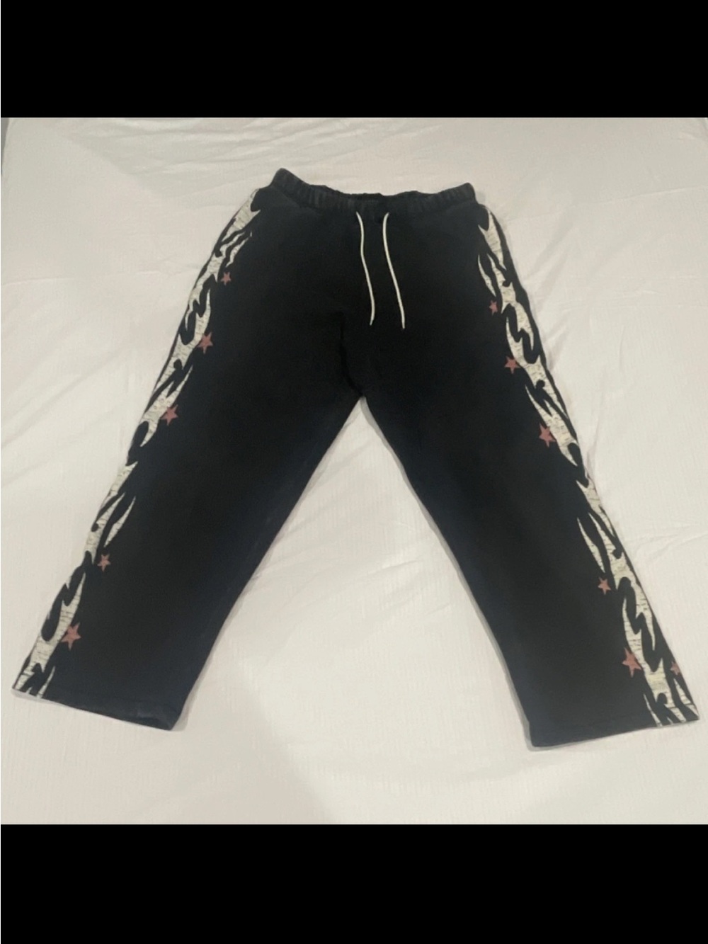 PacSun Black Elastic Waist super baggy sweatpants with fire design on sides